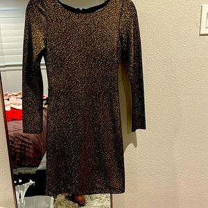 Stunningly gorgeous gold and black body con dress